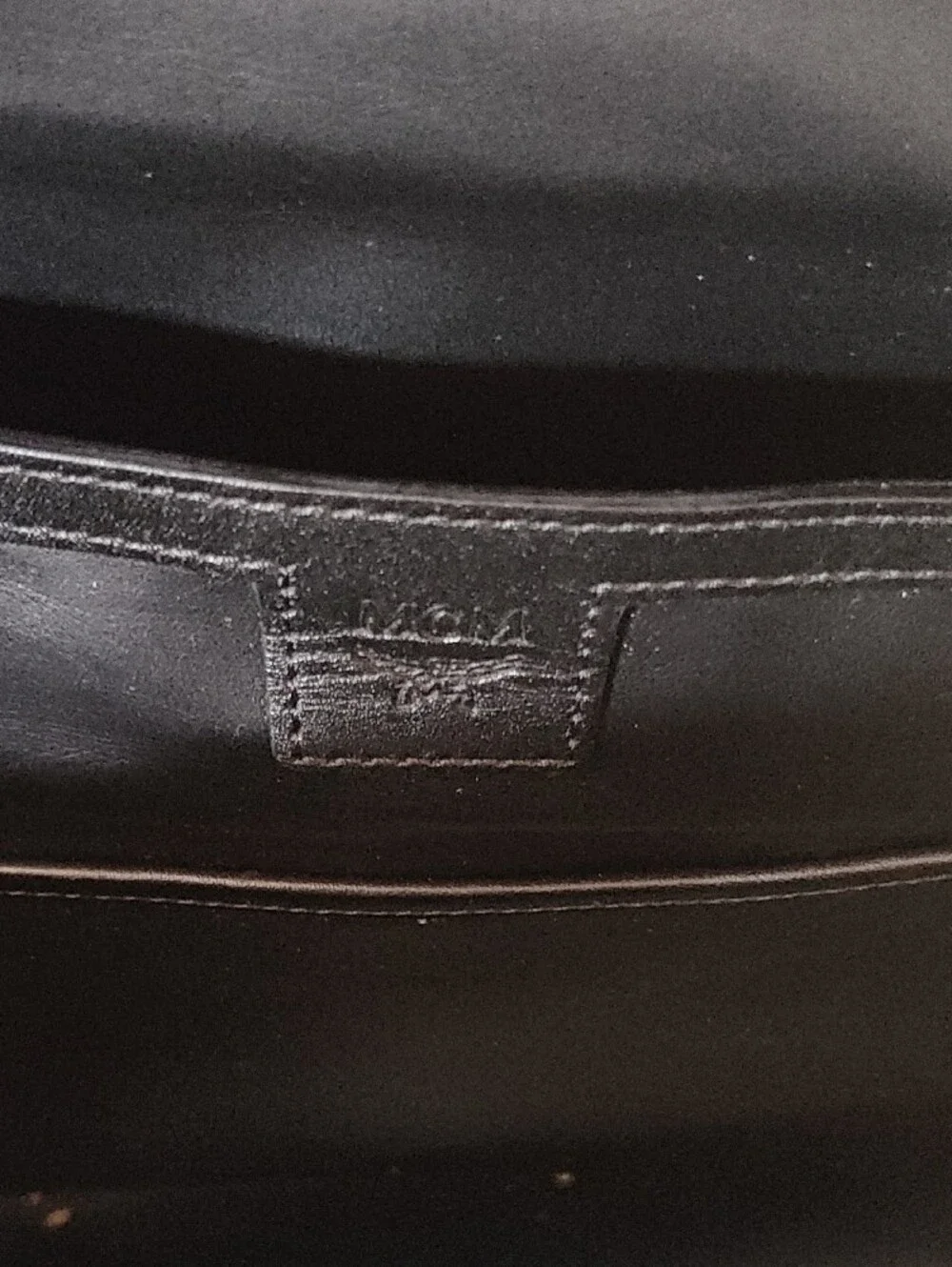 MCM Cognac Logo Print Leather Backpack with Gold Plate